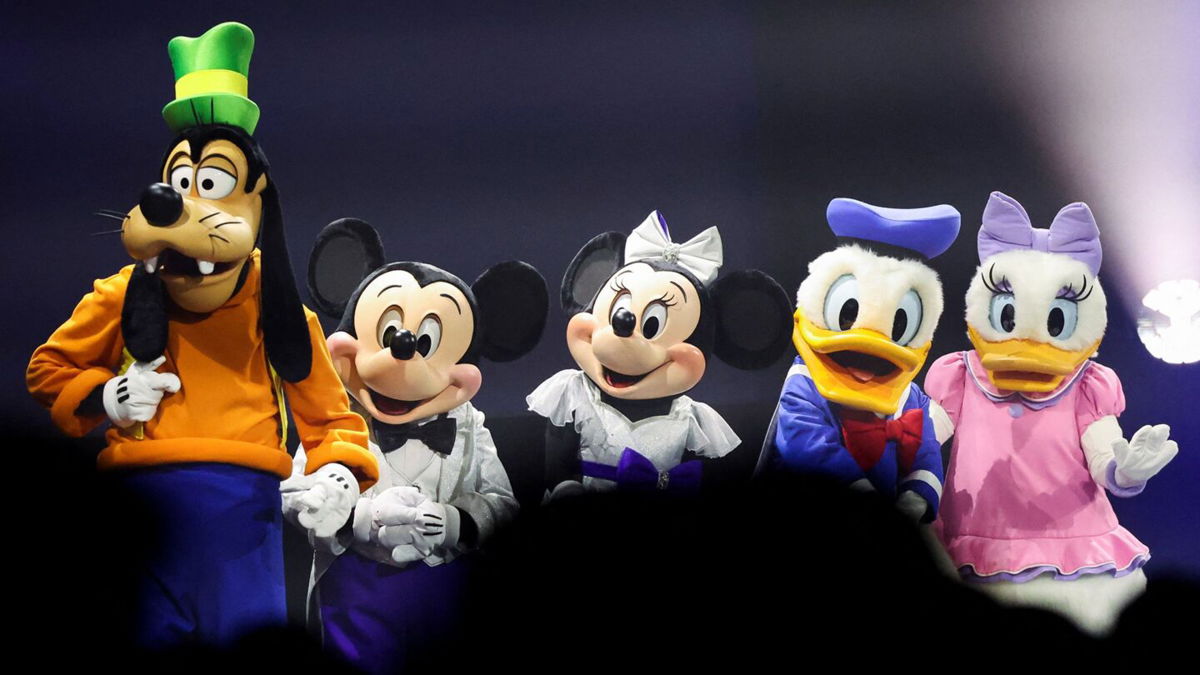 <i>Mario Anzuoni/Reuters/FILE</i><br/>Disney characters stand onstage at the 2022 Disney Legends Awards during Disney's D23 Expo in Anaheim