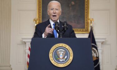 President Joe Biden delivers remarks in the State Dining Room of the White House