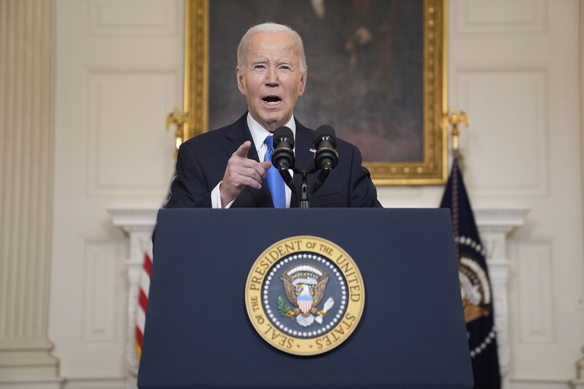 <i>Evan Vucci/AP</i><br/>President Joe Biden delivers remarks in the State Dining Room of the White House