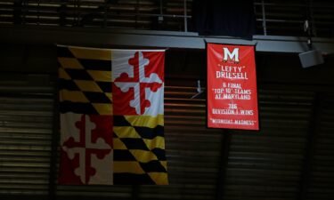 A banner honoring former Maryland men's basketball coach "Lefty" Driesell hangs from the rafters after being unveiled before an NCAA college basketball game between Maryland and Ohio State in 2017.