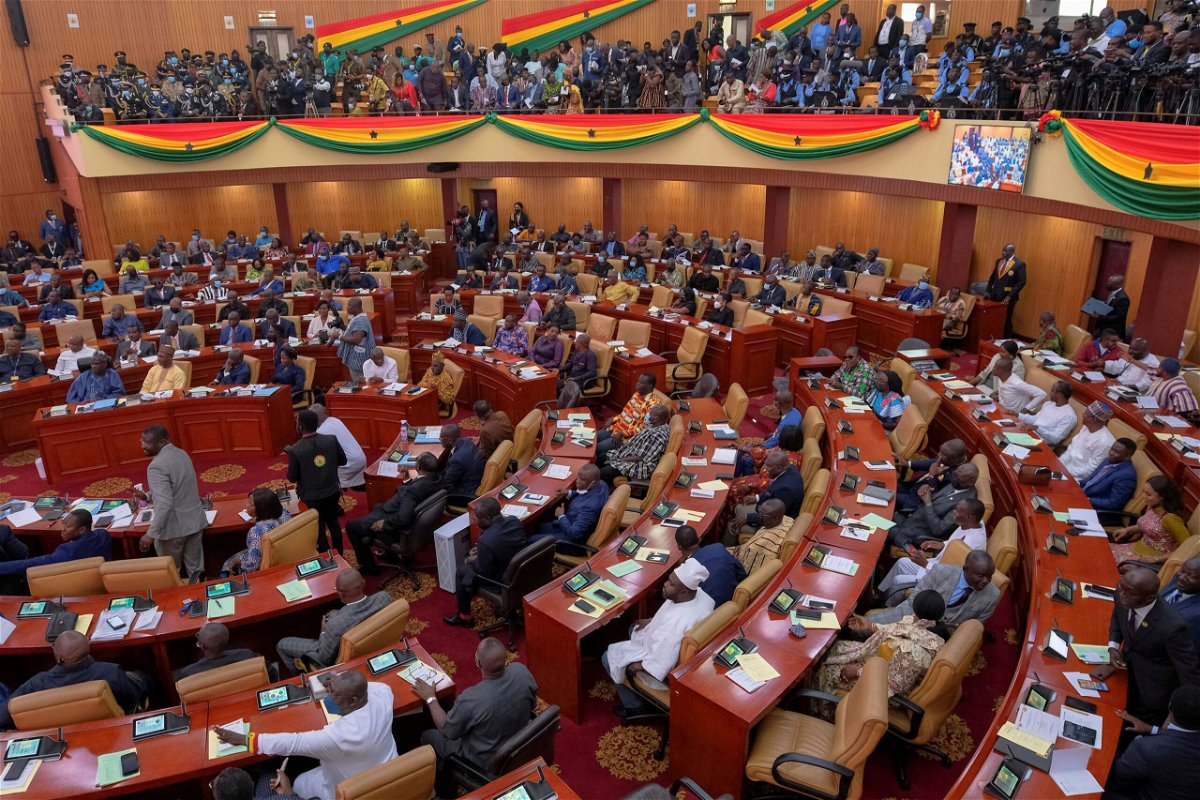 <i>Francis Kokoroko/Reuters via CNN Newsource</i><br/>Parliamentarians and members of the public listen as Ghanaian President Nana Akufo-Addo delivers his annual state of the nation address in March 2022.