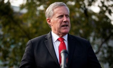 Then-White House chief of staff Mark Meadows speaks to reporters following a television interview outside the White House in Washington in October 2020.