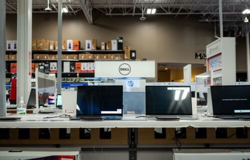 Dell laptops are seen on display at a Best Buy store on June 02