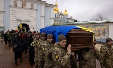 Soldiers carry the coffin of Ukrainian poet and serviceman Maksym Kryvtsov who was killed in action fighting against Russia's attack on Ukraine