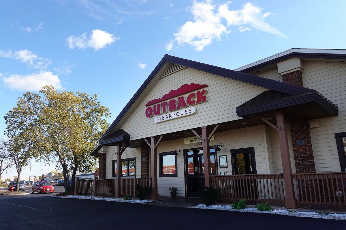 <i>Scott Olson/Getty Images/FILE via CNN Newsource</i><br/>An Outback Steakhouse restaurant in a 2021 photo. The chain’s parent company abruptly shut down dozens of locations around the United States.