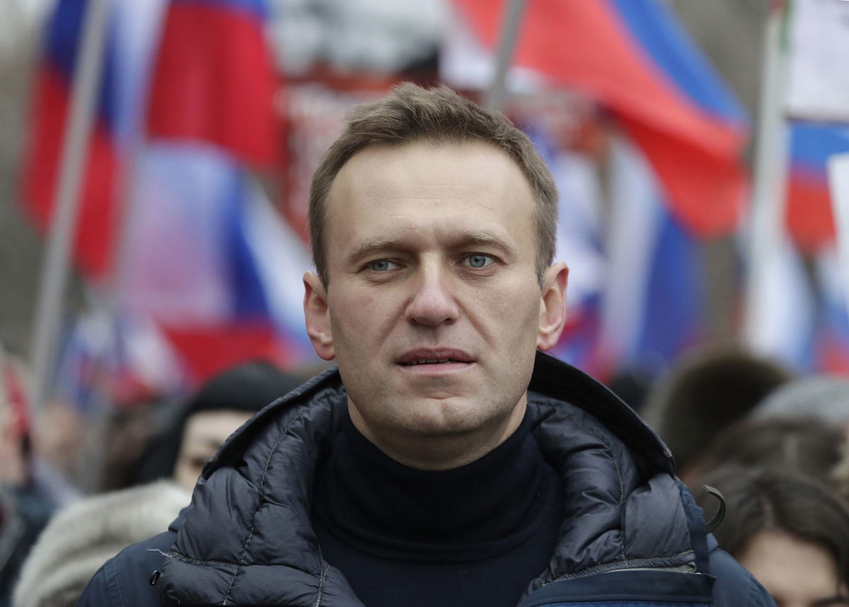 <i>Ebrahim Noroozi/AP via CNN Newsource</i><br/>Flowers and candles were laid in a memorial for Alexey Navalny in front of the Russian embassy in Berlin