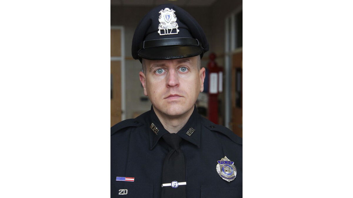 <i>Gary Higgins/AP</i><br/>Officer Michael C. Chesna was fatally shot with his own service weapon by a man who used the same gun to kill a female bystander in her home