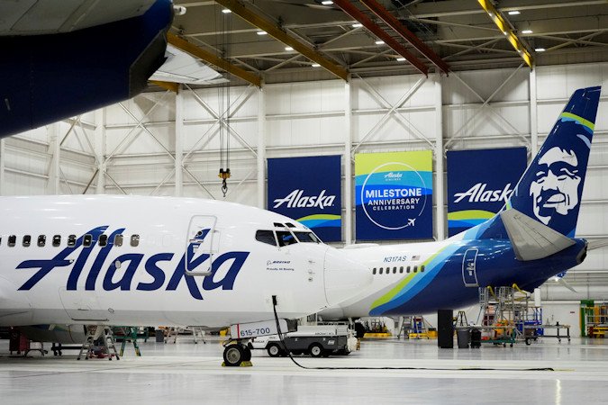Alaska Airlines aircraft sit in the airline's hangar at Seattle-Tacoma International Airport Wednesday, Jan. 10, 2024, in SeaTac, Wash. 