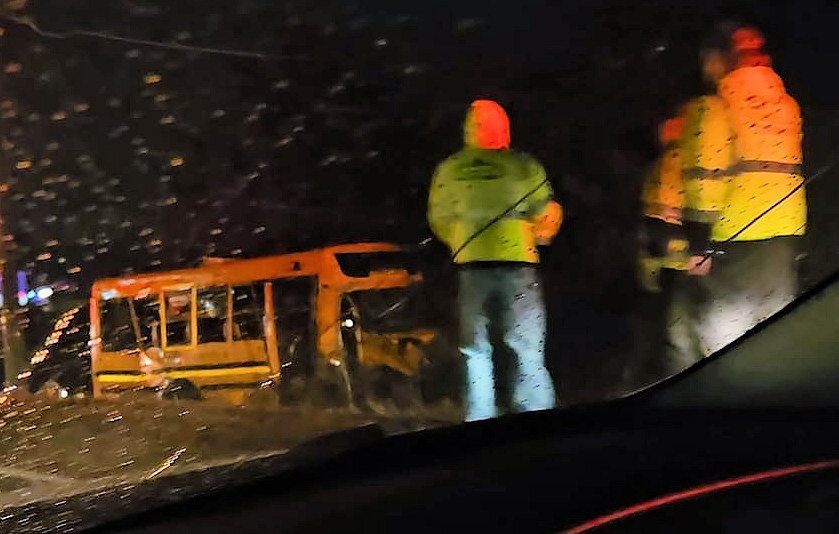 An SUV crashed into a Baker School District mini-bus on Hwy. 126 in Redmond Friday night, sending it into a roadside ditch and causing minor injuries to three students, officials said.