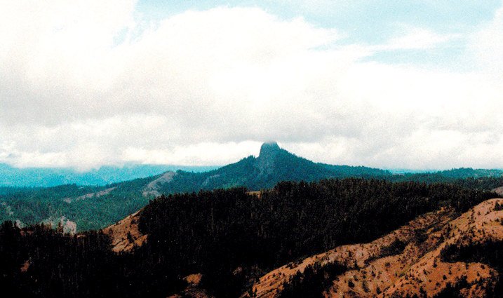  Pilot Rock rises into the clouds in the Cascade-Siskiyou National Monument in July 2000