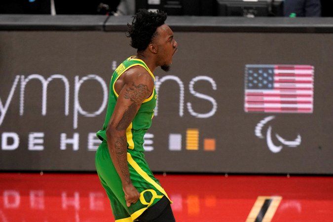 Oregon's Jermaine Couisnard celebrates after hitting a three-point shot against South Carolina during the second half of a first-round college basketball game in the NCAA Tournament in Pittsburgh on Thursday