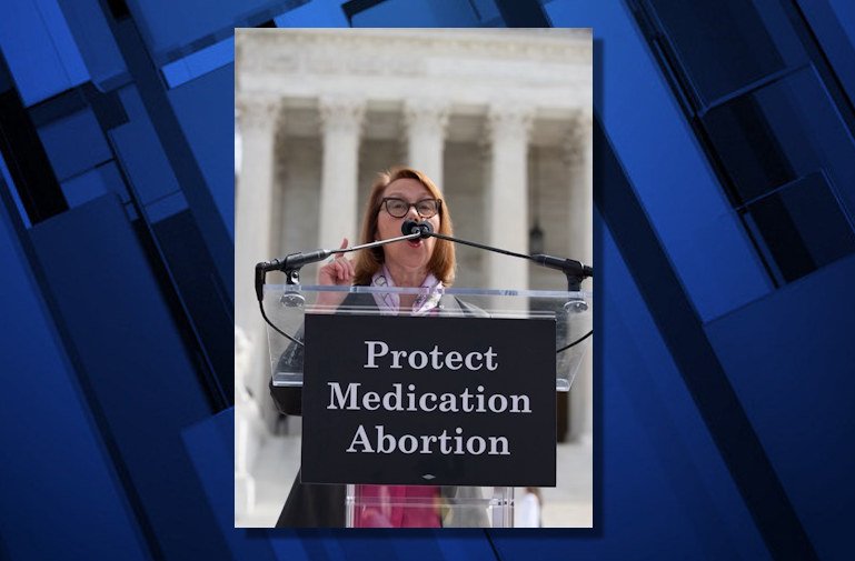 Oregon Attorney General Ellen Rosenblum addresses crowd Tuesday at abortion rights rally at U.S. Supreme Court