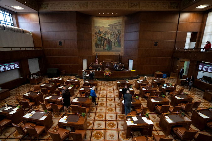 Members of the Oregon Legislature are seen on the Senate floor during the first day of the legislative session at the Oregon Capitol, Monday, Feb. 5, 2024, in Salem.