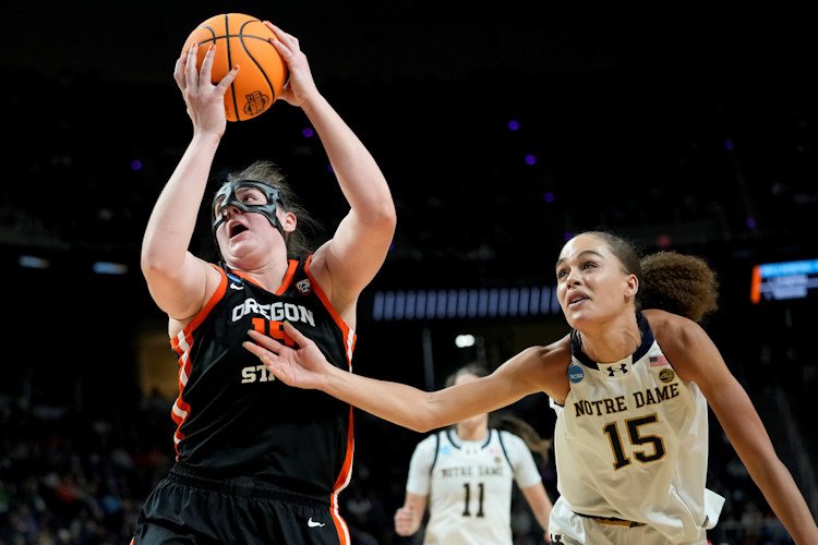 Oregon State forward Raegan Beers (15) shoots against Notre Dame forward Natalija Marshall (15) during the second quarter of a Sweet Sixteen round college basketball game during the NCAA Tournament, Friday,  in Albany, N.Y. 