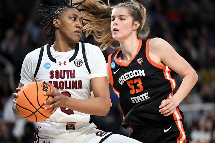 South Carolina forward Ashlyn Watkins (2) drives against Oregon State forward Kelsey Rees (53) during the first quarter of an Elite Eight round college basketball game during the NCAA Tournament on Sunday in Albany, N.Y. 