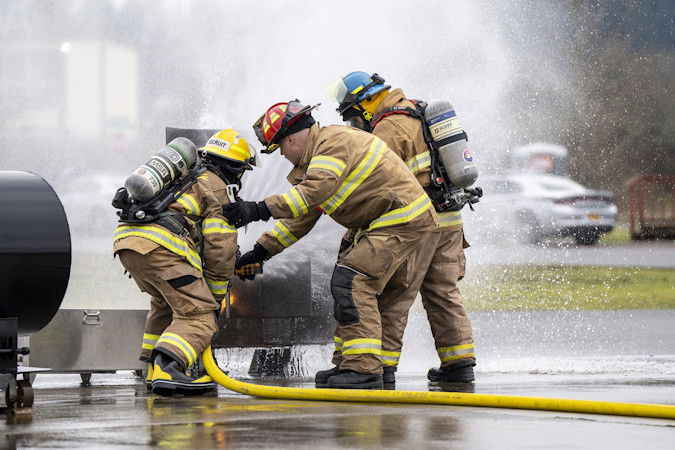 Oregon fire service members participate in the Department of Public Safety Standards and Training's Winter Fire School at the Oregon Public Safety Academy in Salem.