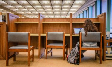 A student studies in the Perry-Castaneda Library at the University of Texas at Austin on February 22.