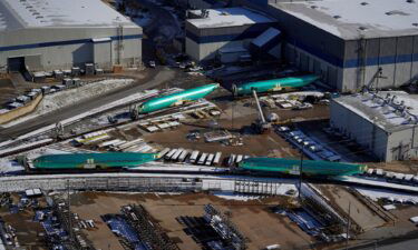 Airplane fuselages bound for Boeing's 737 Max production facility await shipment in Wichita