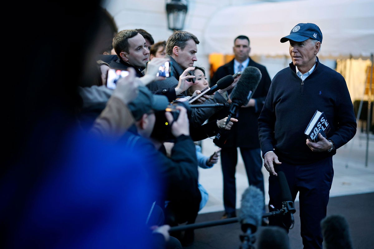 <i>Chip Somodevilla/Getty Images via CNN Newsource</i><br/>US President Joe Biden stops to talk to reporters as he departs the White House on March 1.