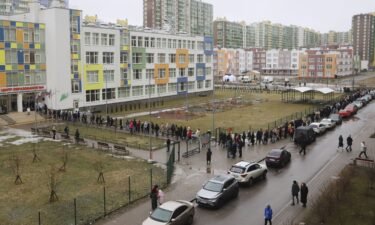 Voters queue at a polling station in St. Petersburg