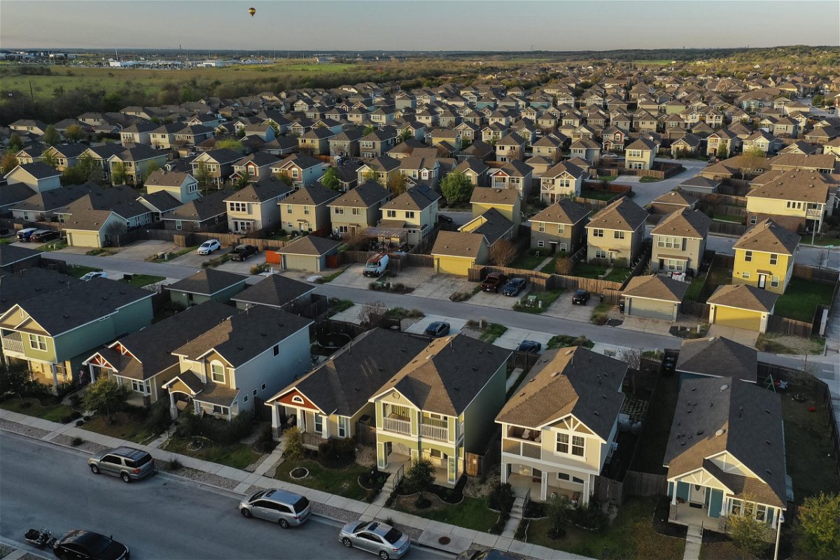 <i>Jordan Vonderhaar/Bloomberg/Getty Images via CNN Newsource</i><br/>Pictured are single-family homes in a residential neighborhood in San Marcos