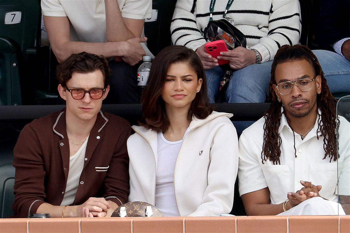 <i>Matthew Stockman/Getty Images via CNN Newsource</i><br/>Tom Holland and Zendaya at the BNP Paribas Open at Indian Wells Tennis Garden on Sunday in California.