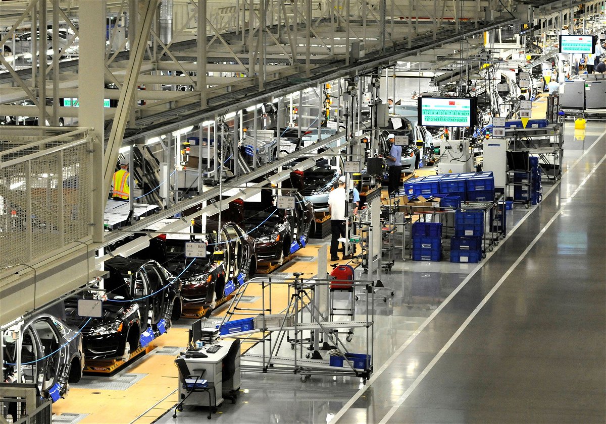 <i>Billy Weeks/Reuters/FILE via CNN Newsource</i><br/>Volkswagen employees work on the assembly line at the Volkswagen plant in Chattanooga