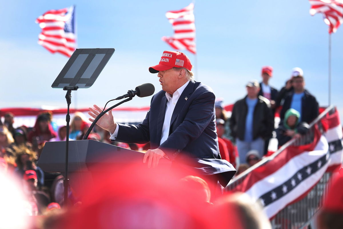 <i>Scott Olson/Getty Images via CNN Newsource</i><br/>Republican presidential candidate former President Donald Trump speaks to supporters during a rally at the Dayton International Airport on March 16 in Vandalia