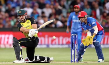 Australia's Marcus Stoinis plays a sweep shot against Afghanistan during the ICC men's T20 World Cup in 2022.