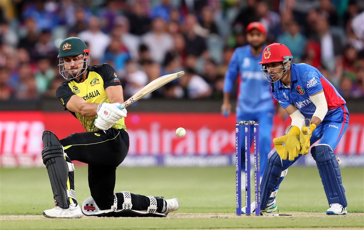 <i>Sarah Reed/Getty Images via CNN Newsource</i><br/>Australia's Marcus Stoinis plays a sweep shot against Afghanistan during the ICC men's T20 World Cup in 2022.