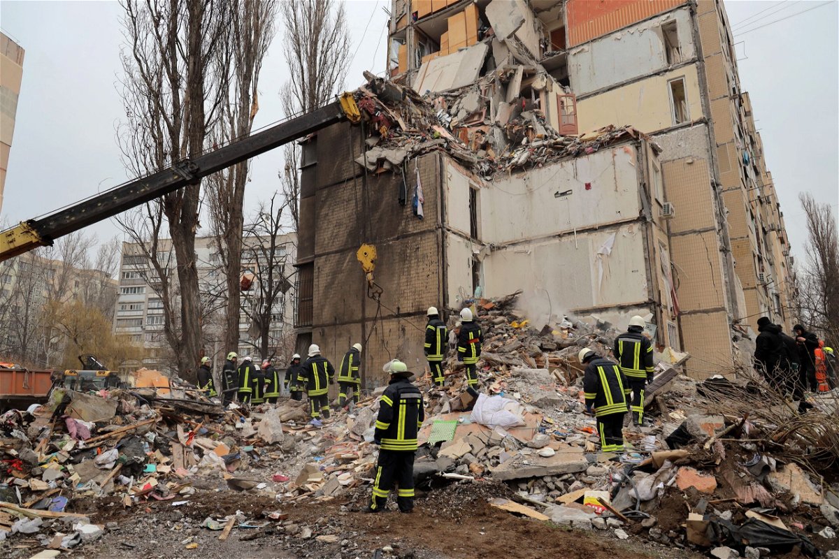 <i>Oleksandr Gimanov/AFP/Getty Images via CNN Newsource</i><br/>Rescuers work at the site of a heavily damaged multi-story apartment building