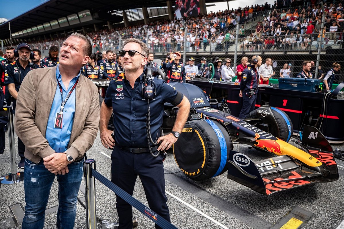 <i>Cristiano Barni/ATPImages/Getty Images via CNN Newsource</i><br/>Jos Verstappen and Christian Horner stand on the grid in Austria last year.