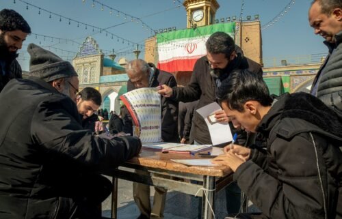 Iranian President Ebrahim Raisi casts his vote at a Tehran polling station on March 1.
