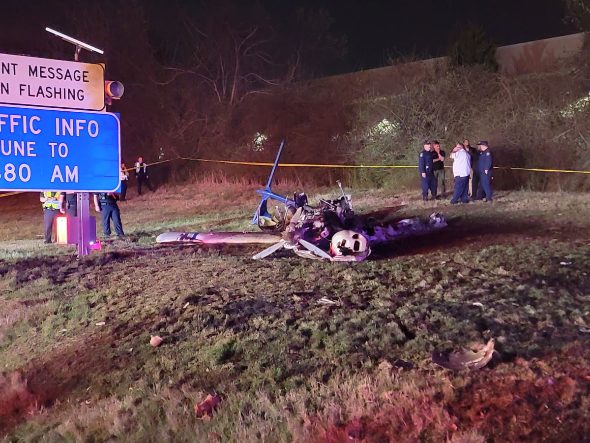 <i>Metro Nashville Police Department via CNN Newsource</i><br/>The mangled frame of an airplane lies at the scene of a crash near Nashville's Interstate 40 Monday night.