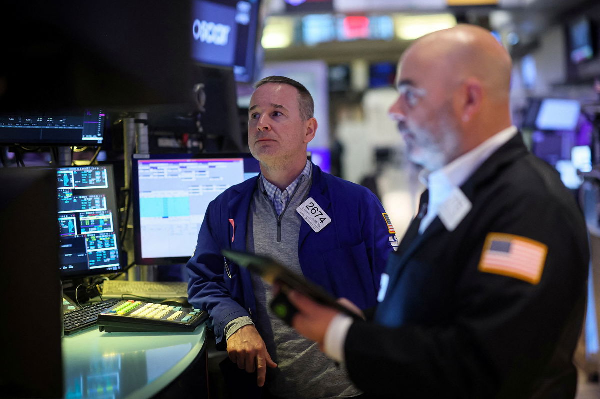 <i>Brendan McDermid/Reuters via CNN Newsource</i><br/>Traders work on the floor at the New York Stock Exchange on March 5. Stocks tumbled Tuesday with tech stocks leading the way