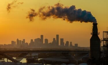The Houston skyline is seen from an oil refinery on August 28