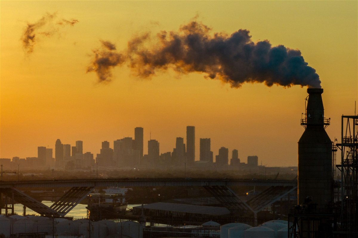 <i>Brandon Bell/Getty Images/File via CNN Newsource</i><br/>The Houston skyline is seen from an oil refinery on August 28