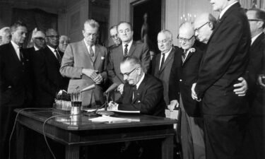 President Lyndon Baines Johnson signs the Civil Rights Act on July 2
