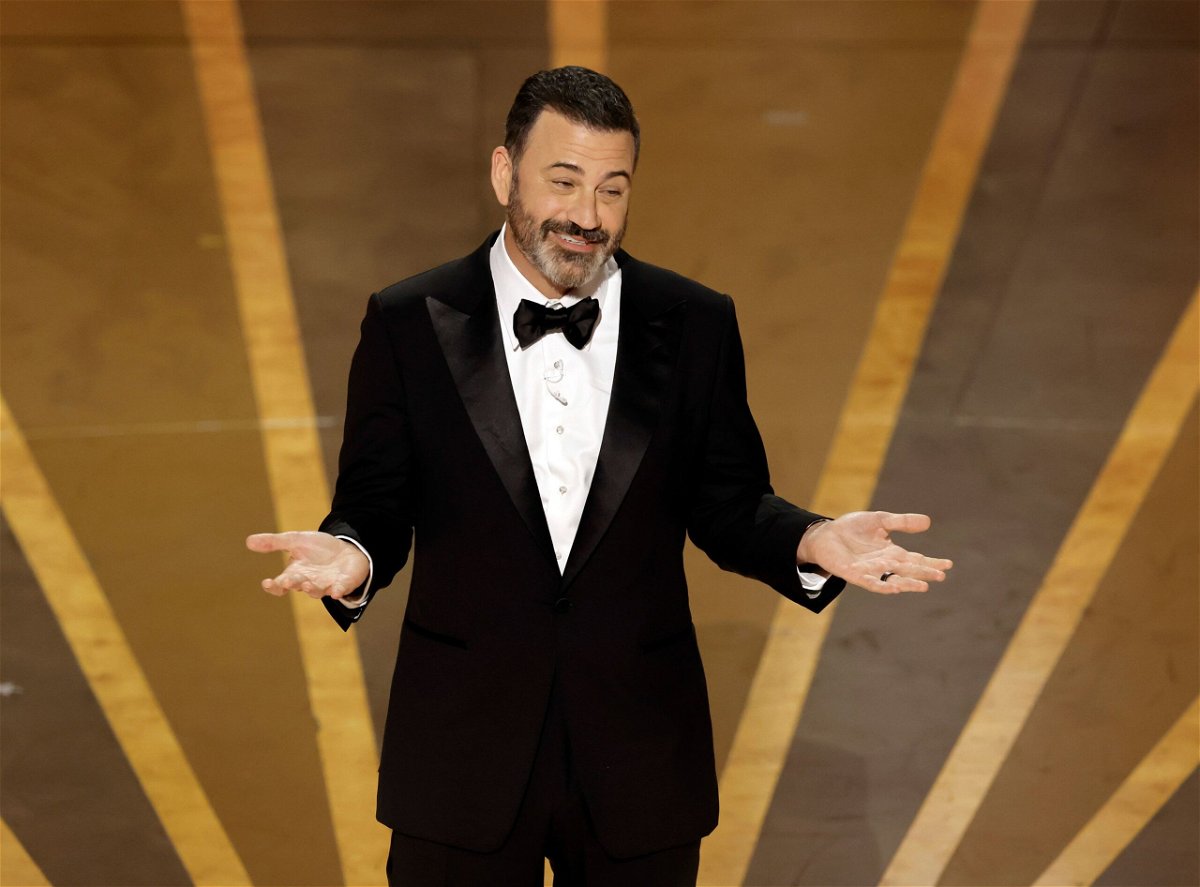 <i>Kevin Winter/Getty Images via CNN Newsource</i><br/>Jimmy Kimmel pictured on stage at the Oscars in 2023. He will return this year to host the Oscars for the fourth time.