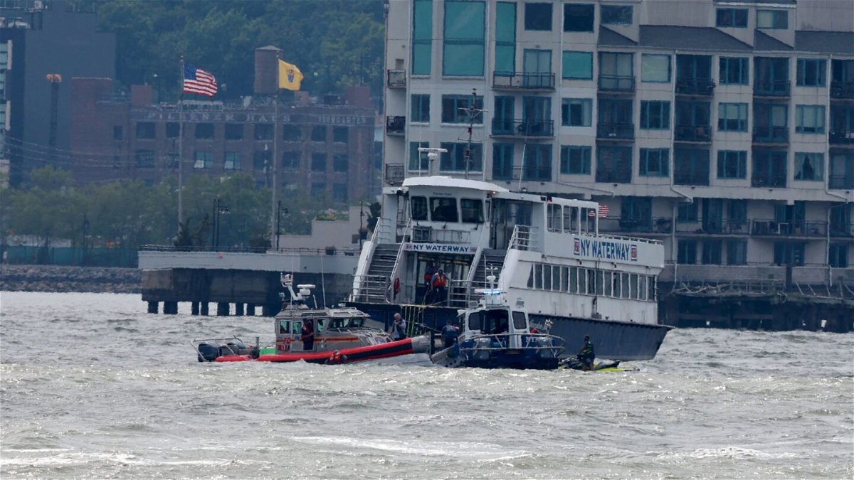 <i>Luiz C. Ribeiro/For NY Daily News/Getty Images via CNN Newsource</i><br/>NYPD and FDNY scuba dive teams and a NY Waterway Ferry float near the boat accident on the Hudson River in 2022.