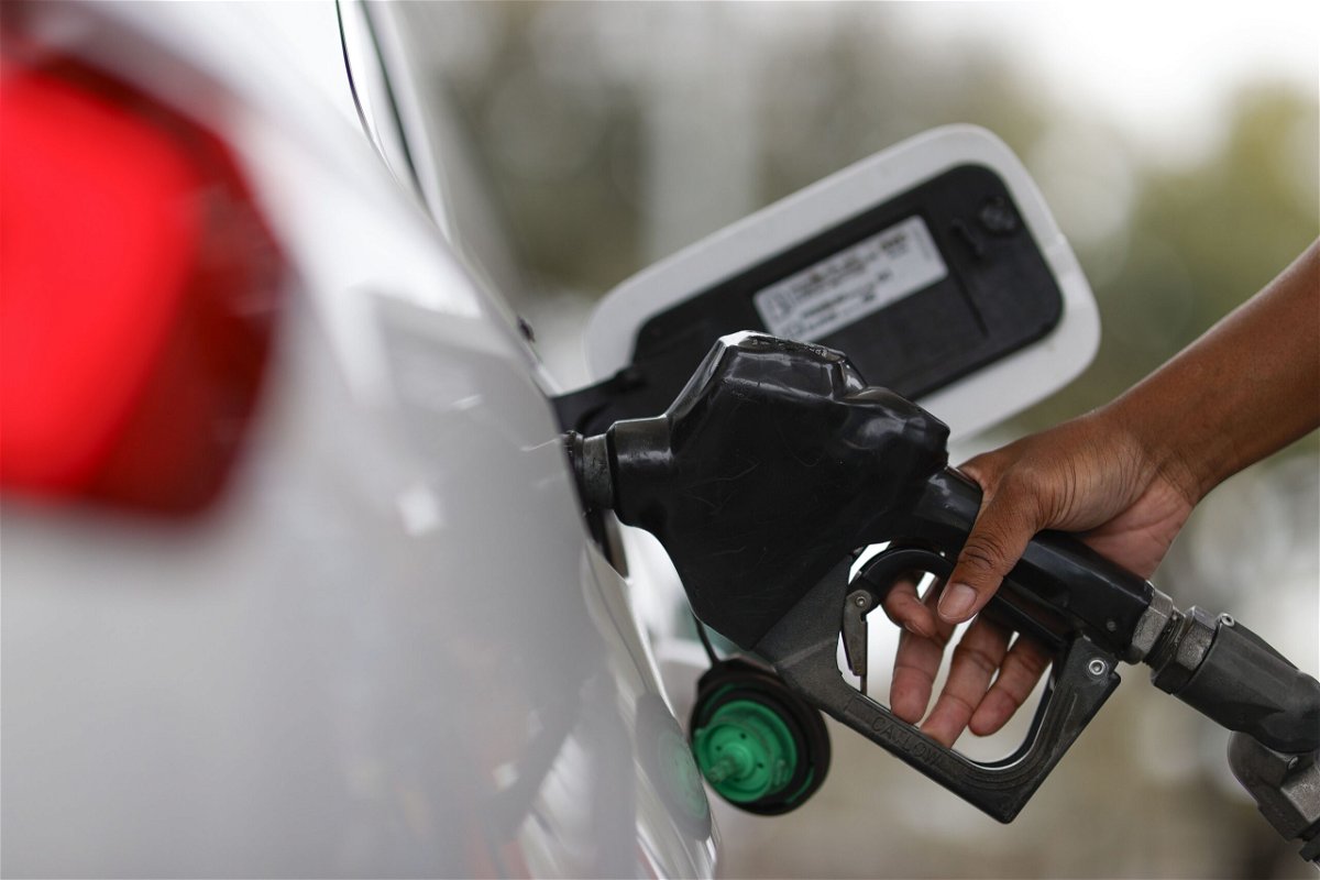 <i>Aaron M. Sprecher/AP via CNN Newsource</i><br/>A motorist fills up with fuel at an Exxon gas station