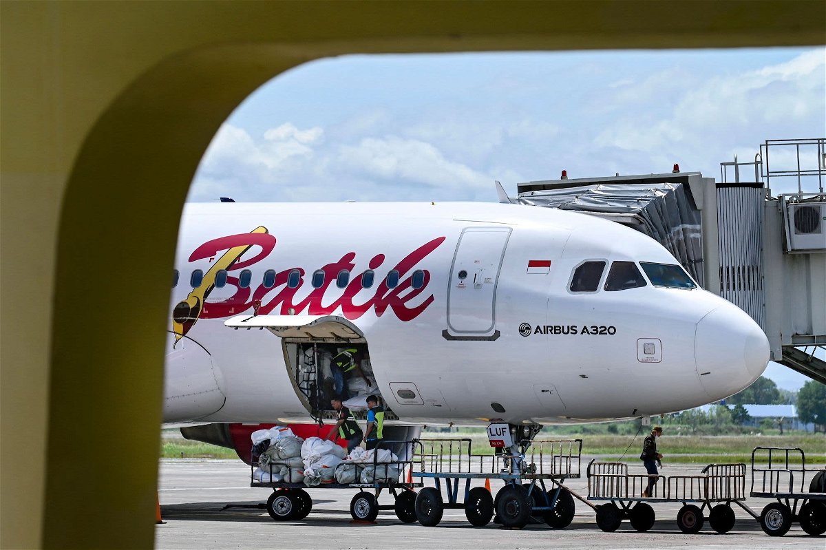 <i>Chaideer Mahyuddin/AFP/Getty Images via CNN Newsource</i><br/>A Batik Air passenger plane is pictured at Sultan Iskandar Muda International Airport in Indonesia in 2022.