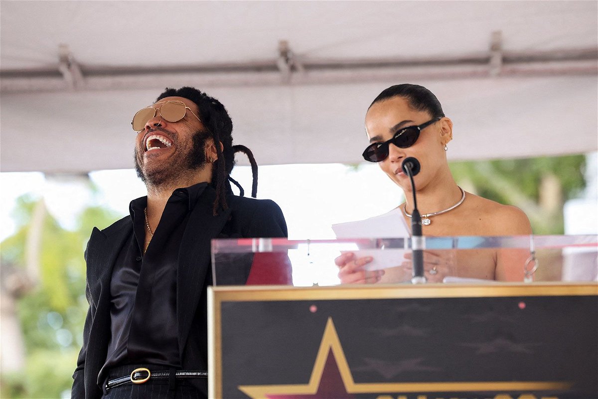 <i>Mario Anzuoni/REUTERS/REUTERS via CNN Newsource</i><br/>Lenny Kravitz reacts as Zoë Kravitz speaks during the unveiling ceremony of his star on the Hollywood Walk of Fame