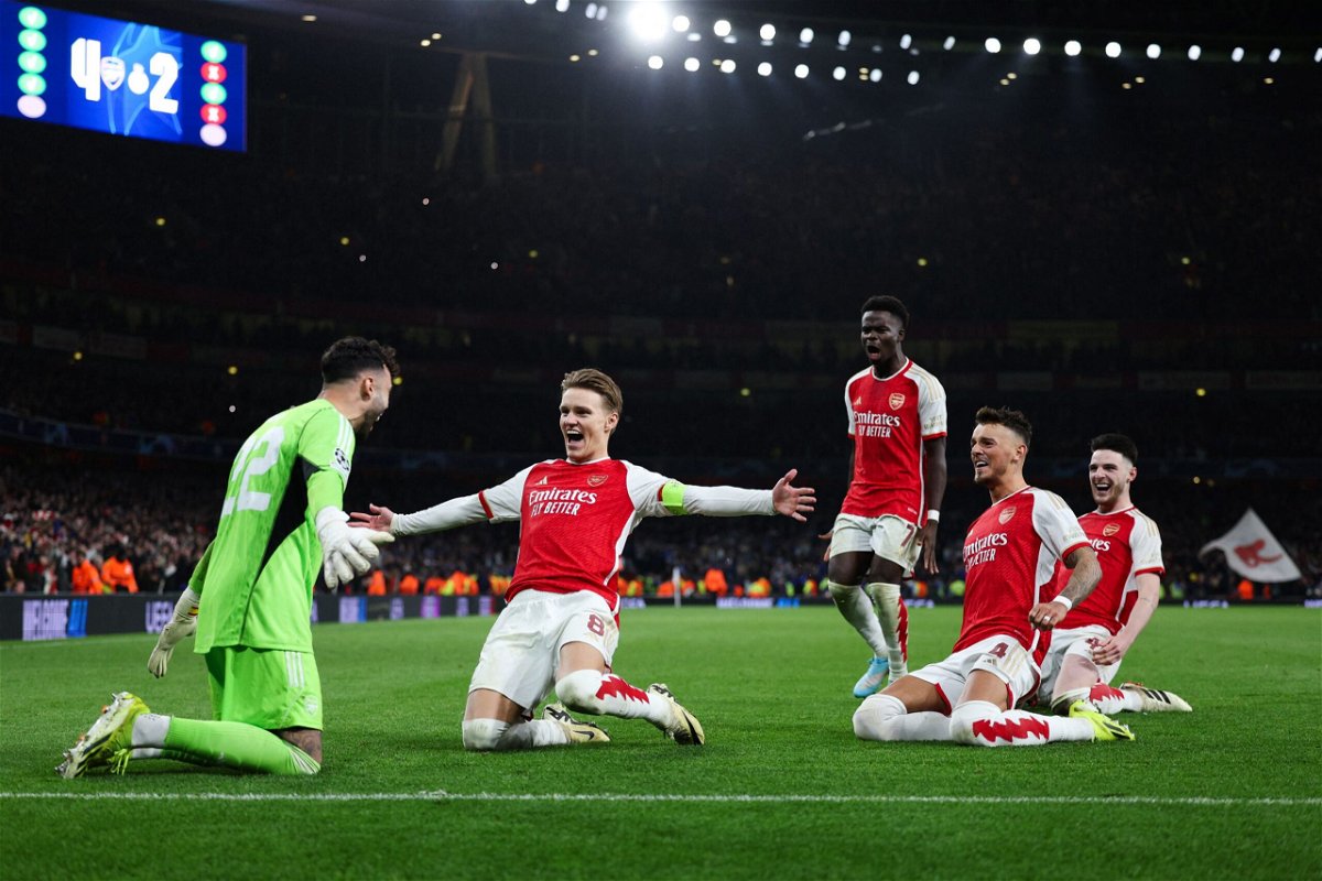 <i>Adrian Dennis/AFP/Getty Images via CNN Newsource</i><br/>David Raya celebrates with his Arsenal teammates after saving two penalties.