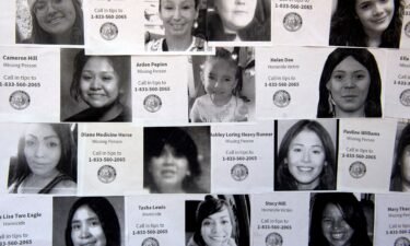 A poster displays the faces of missing or murdered indigenous persons during a student-led rally held by students from the American Indian Academy of Denver during Missing or Murdered Indigenous Persons Awareness Day on May 5