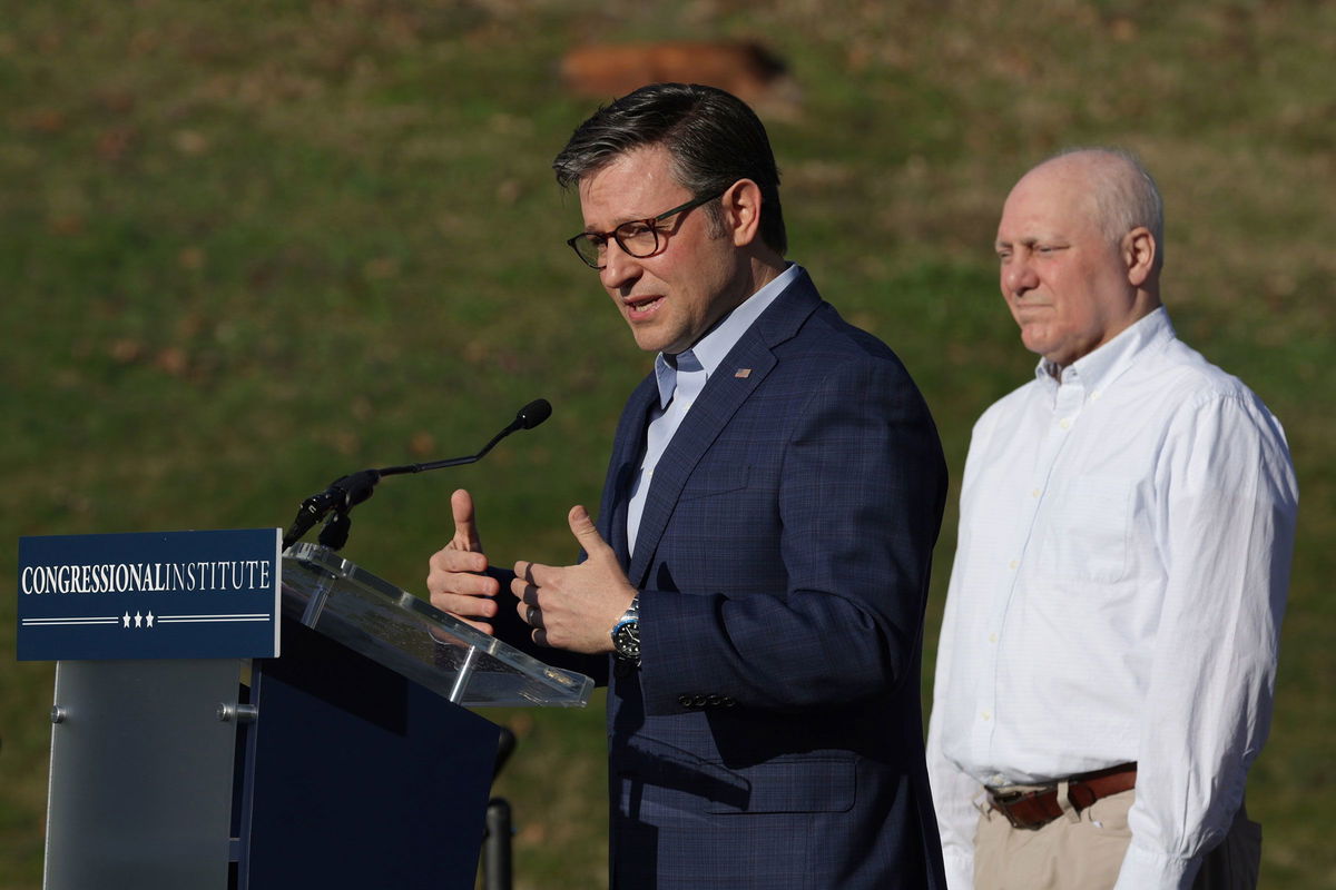 <i>Alex Wong/Getty Images via CNN Newsource</i><br/>House Speaker Mike Johnson speaks as House Majority Leader Steve Scalise listens during a House GOP leadership news conference at the Greenbrier Hotel on March 14 in White Sulphur Springs