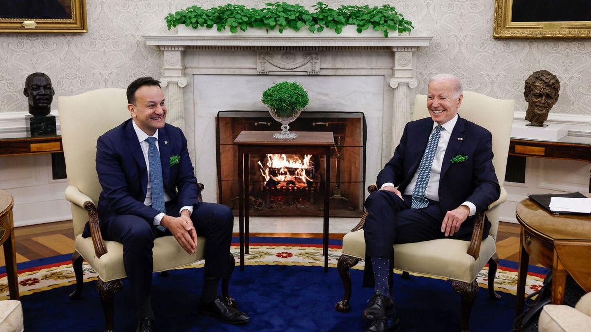 <i>Anna Moneymaker/Getty Images via CNN Newsource</i><br/>President Joe Biden and Irish Taoiseach Leo Varadkar speak to one another in the Oval Office of the White House on March 17