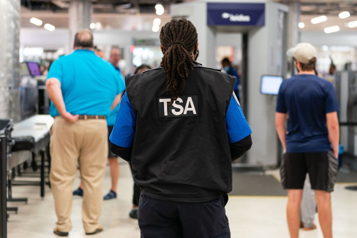 <i>Elijah Nouvelage/Bloomberg/Getty Images via CNN Newsource</i><br/>A TSA officer at Hartsfield-Jackson Atlanta International Airport in Atlanta in October 2023.