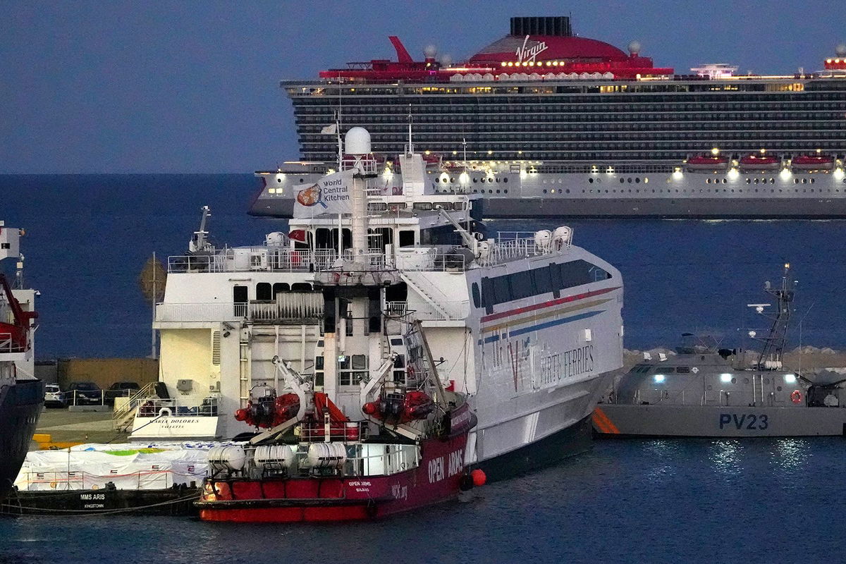 <i>Petros Karadjias/AP via CNN Newsource</i><br/>Aid packages are seen on a platform near to the docked ship belonging to the Open Arms aid group