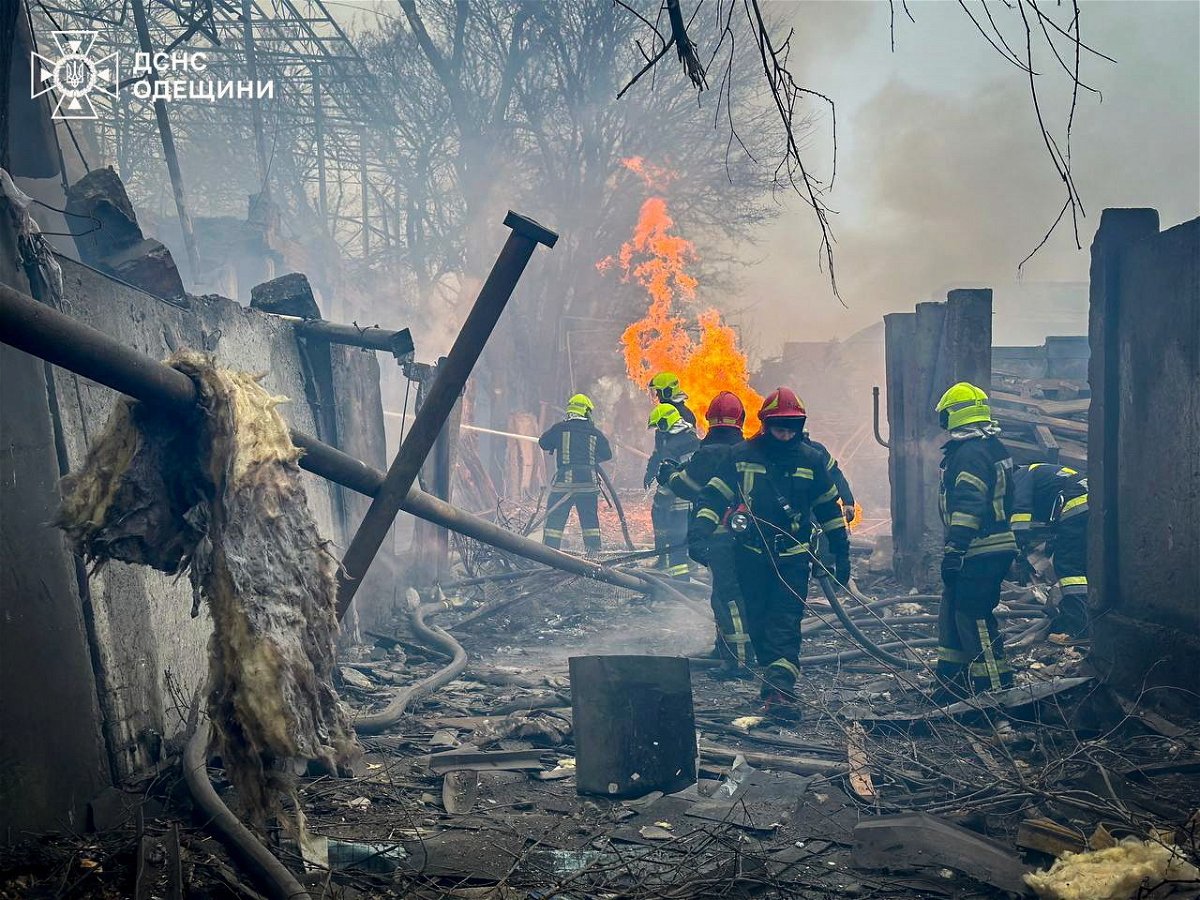 <i>State Emergency Service of Ukraine/Reuters via CNN Newsource</i><br/>Firefighters respond to a Russian missile strike in Ukraine's Black Sea port city of Odesa